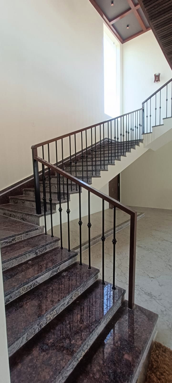 The internal staircase rising to the first floor of the farmhouse.